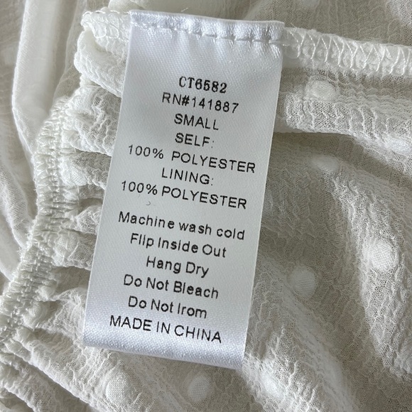 TCEC Dobby Mesh Tie Front Peplum Top - Picture 16 of 16